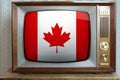 Old tube vintage TV with the national flag of Canada on the screen, the concept of eternal values Ã¢â¬â¹Ã¢â¬â¹on television, global